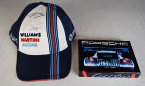 Signed Valtteri Bottas and Felipe Massa F1 cap and a Porsche book