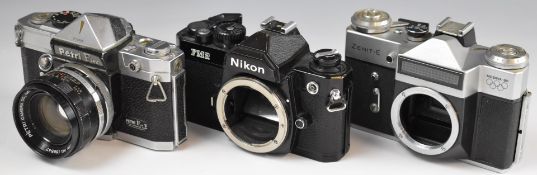 Three 35mm SLR cameras comprising Nikon FM2, Moscow Olympics Zenit-E and Petri Flex with 1:2 f=