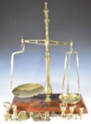 W & T Avery brass banker's scales with baluster faceted column support, marked to beam with maker'
