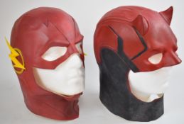 Two Marvel and DC latex adult sized masks comprising Daredevil and The Flash, both with mannequin