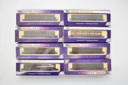 Eight Dapol BR N gauge model railway auto coaches, all in original boxes.