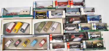 Twenty-two Cararama 1:43 scale diecast model cars including single and multi vehicle sets, all in