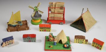 Richard Zeumer, B Muller and Erzgebirge carved wooden and scale model toys including newspaper rack,