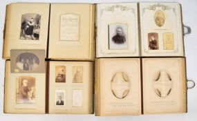 Four leather covered albums to suit studio portrait photographs, some with contents including