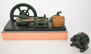 Live steam horizontal stationary engine, with double acting cylinder, spoked flywheel and boiler