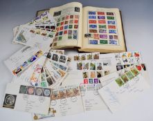 The Meteor stamp album containing GB and world mint and used stamps and a collection of loose GB and