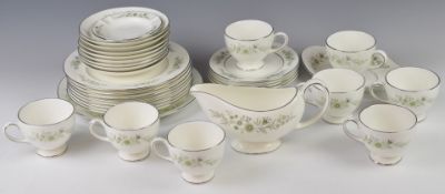 Wedgwood dinner and tea ware decorated in the Westbury pattern, approximately thirty two