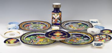 A collection of Copenhagen and Rosenthal pin dishes, cabinet plates and a candle holder by Bjorn