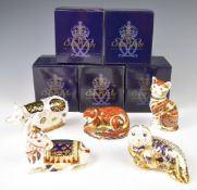 Five Royal Crown Derby Imari paperweights in boxes, including Otter, Spotty Pig and Harbour Seal