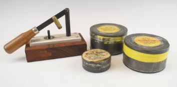 A shotgun cartridge capper/ decapper and three tins of percussion caps and primers.