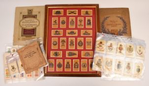 A collection of military paper and silk cigarette cards including a mounted display of colonial
