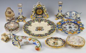 Collection of continental faience ware ceramics including figural cat dish, clock, candlesticks,