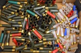 A collection of shotgun cartridge re-loading items including roll turnover tool and 10 and 12 bore