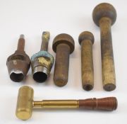 A collection of 10 bore re-loading tools comprising three wooden wad punches, two wad cutters and