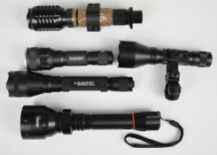 Five Tracer and similar gun lights including LED Ray, two with scope mounts.