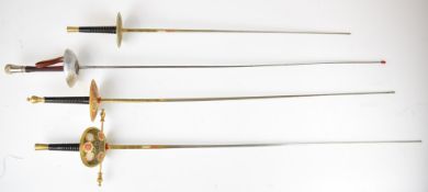 Four fencing foils / epis, three with decorated hilts, the other by Leon Paul, longest blade 90cm.