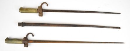 Two French 1866 pattern Lebel bayonets both with button catches, one with shortened 41cm cruciform