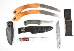 Three hunting knives comprising a Cobra Gunskin, Schrade Old Timber and one other together with