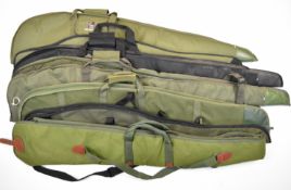 Seven padded shotgun or rifle slips including three Buffalo River and one Sabre.