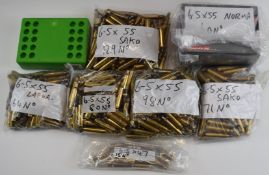 Rifle cartridge re-loading die set 605x55 Swedish and related empty brass cases.
