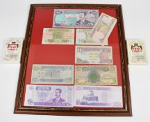 Two packs of Iraq War Saddam Hussein (most wanted) playing cards, one still sealed, together with