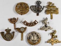 Ten British Army Infantry badges including King's Own Yorkshire Light Infantry, Royal West Kent