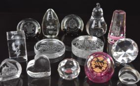 Fourteen glass paperweights including Caithness and Dartington, some limited edition and some with