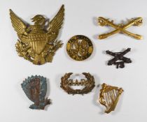 Seven various metal badges including GAR, 12th Regiment and Artillery