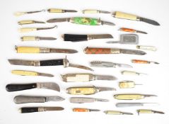 Small collection of pocket souvenir knives including Stag of Ireland, Richards Sheffield and Witness