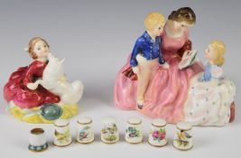 Two Royal Doulton figures comprising The Bedtime Story, Home Again, a Herend signed thimble and