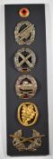 Six post WW1 German military badges including Tank Regiment and Artillery