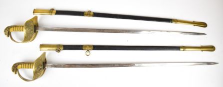 Two replica RAF senior officer's swords with eagle head pommel and cypher to hilt, longest blade