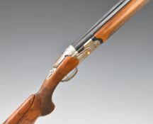 Beretta 682 Gold E 12 bore over and under ejector shotgun with gold inlaid naming, chequered semi-