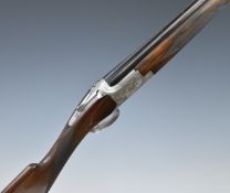 Browning C2G 12 bore over and under shotgun with finely engraved scenes of birds to the locks and