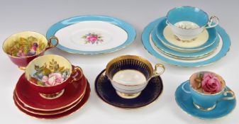 Aynsley decorative teaware comprising two trios, three cups and saucers and cake plate and four cups