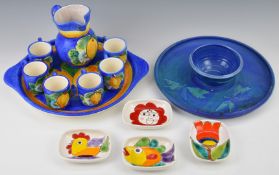 Desimone four Italian pin trays and a Spanish pottery jug and cup set