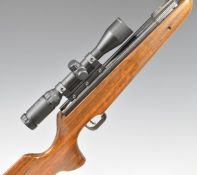Theoben Fenman .22 air rifle with textured semi-pistol grip, raised comb, sound moderator,