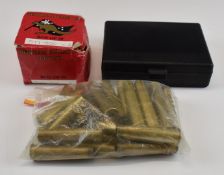 .577-500 rifle cartridge reloading die set and empty brass cases.