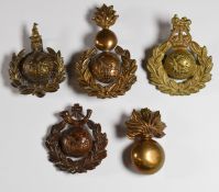 Five Royal Marines badges including Labour Corps, Light Infantry and Artillery