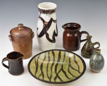 Collection of studio pottery including Oxshott crock, brown glazed jug with tree monogram,