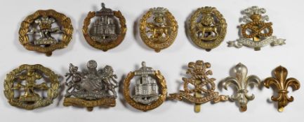 Eleven British Army Infantry cap badges including York and Lancaster Regiment, North Staffordshire