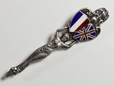 Hallmarked silver pin brooch in the form of a figure holding aloft two shields bearing the French