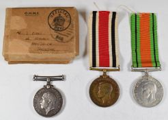 WW1 War Medal named to 7564 Pte W James, Devonshire Regiment, WW2 Defence Medal and Special