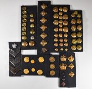 A small collection of rank insignia and buttons including Royal Air Force