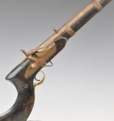 Eastern percussion hammer action jezail rifle with engraved lock and hammer, curved stock, sling