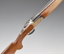Fabarm 12 bore over and under ejector shotgun with engraved locks, top plate, thumb lever and