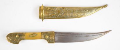 Eastern bone handled dagger with decorated pommel and Syria to sheath, blade length 14.5cm. PLEASE