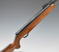 Webley Omega .177 air rifle with chequered semi-pistol grip, raised cheek piece to the stock and