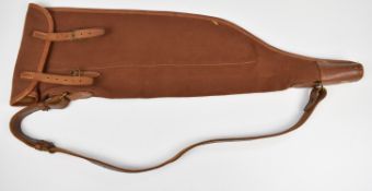 Brady canvas and leather leg of mutton shotgun slip with shoulder strap, 74cm long.
