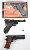 Two replica pistols Denix P-08 Parabellum Luger in original box and BBM Bruni 8mm automatic.